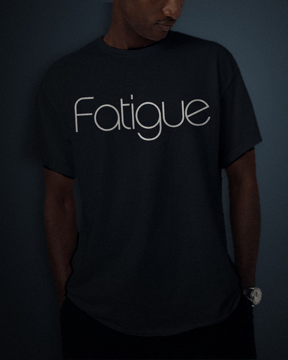 Hairline Geometric tee in black, white full chest print, worn by a model