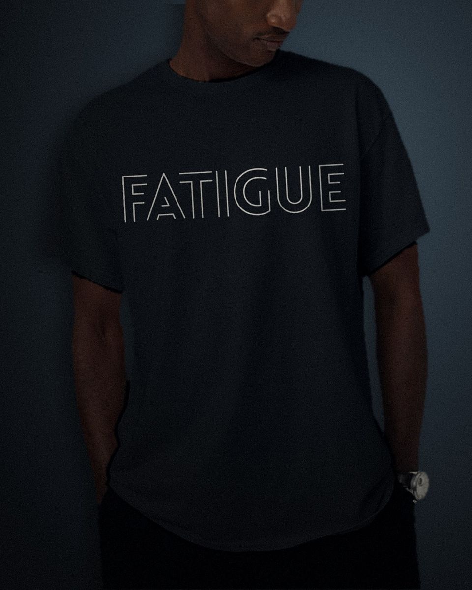 Hollow Outline tee in black, white full chest print, worn by a model