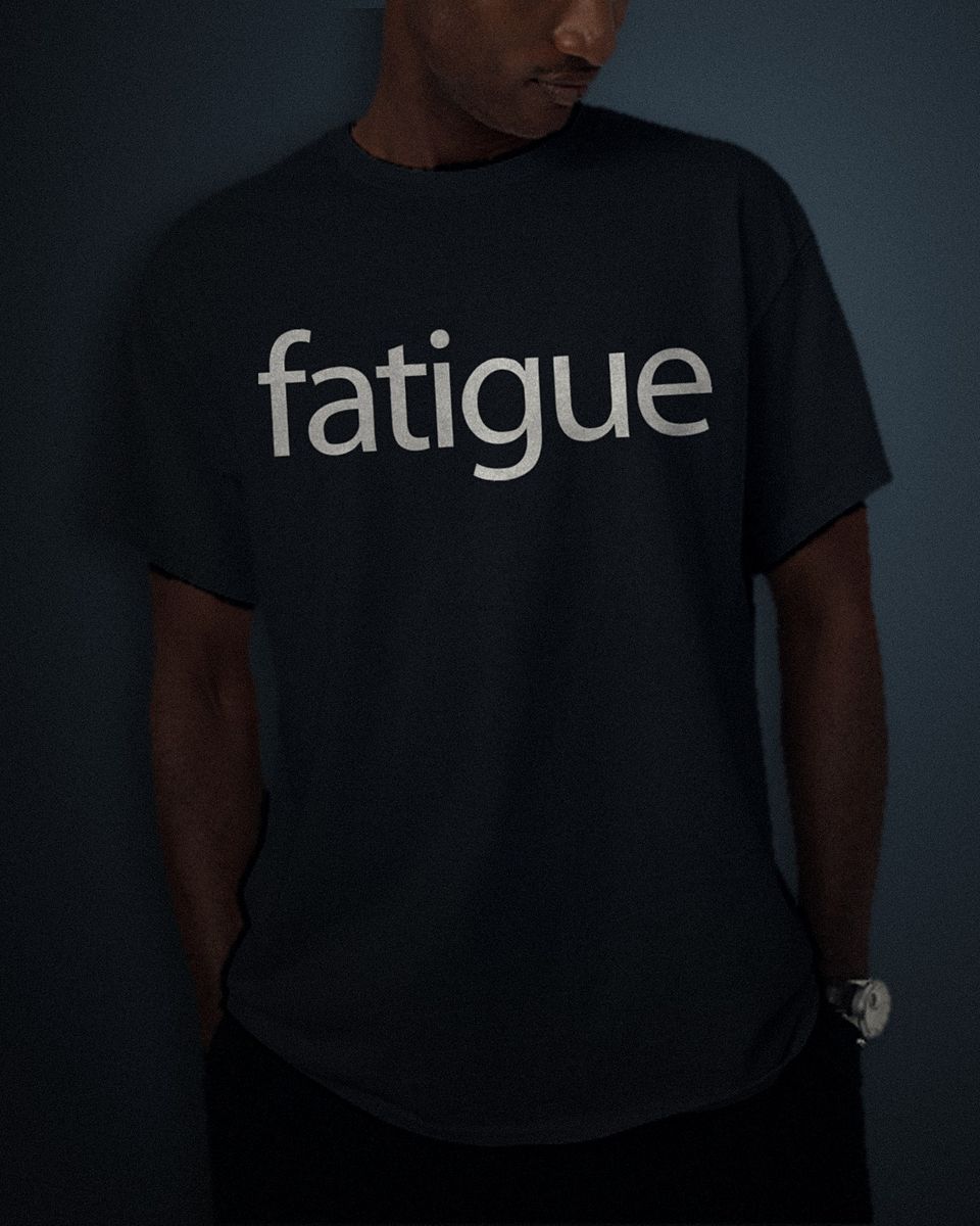 Quiet Lowercase tee in black, white full chest print, worn by a model