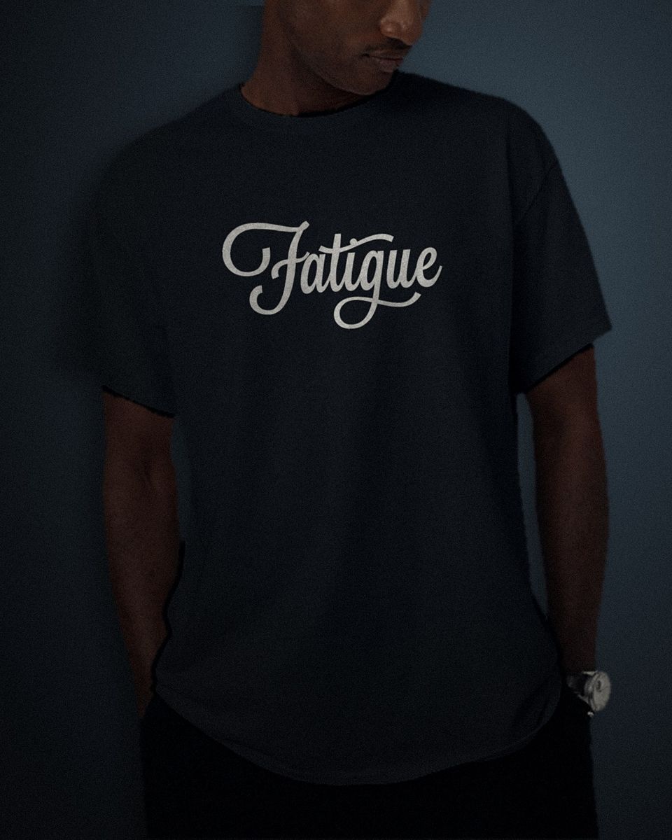 Retro Script tee in black, white full chest print, worn by a model